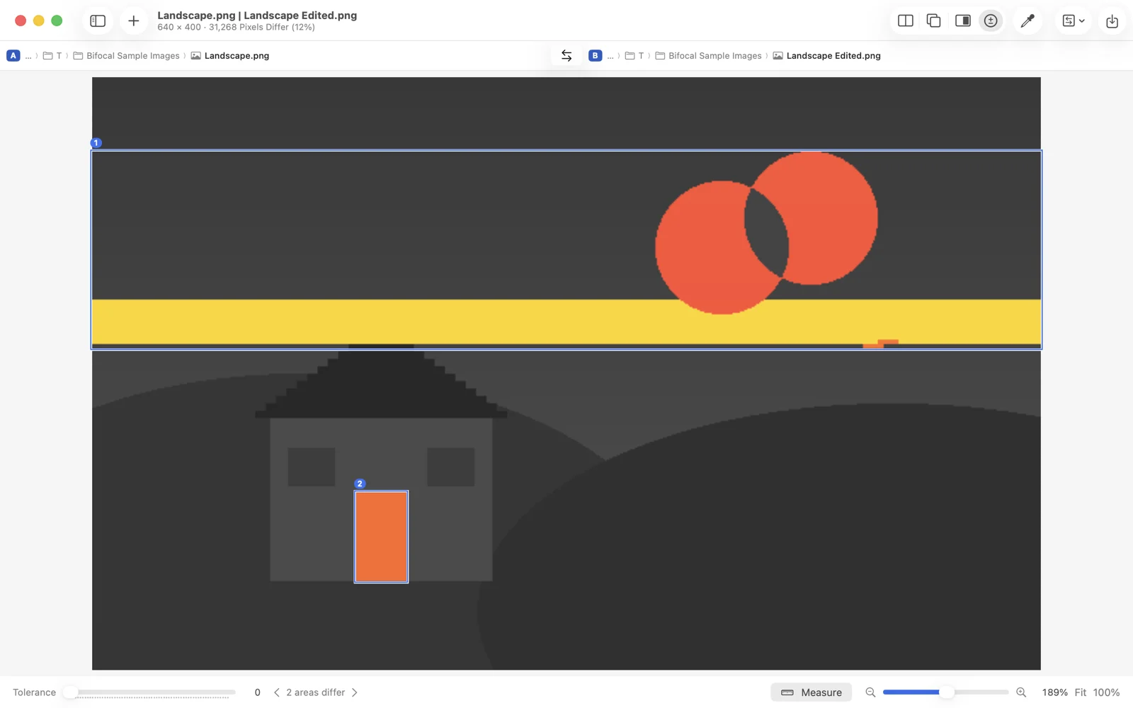 Difference mode: the picture in grey, with the two changed areas in colour and outlined.